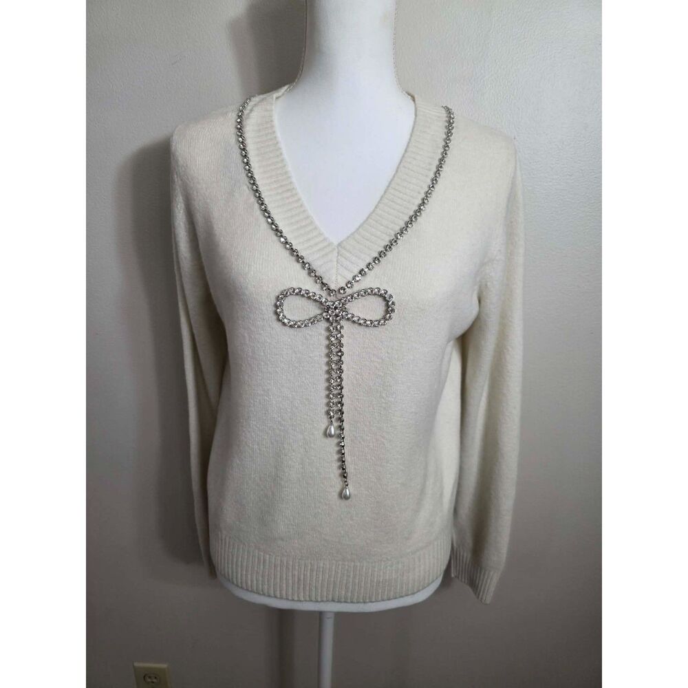 Ivory Rhinestone Bow Embellished V-Neck Sweater β Pearl Dangle Detail